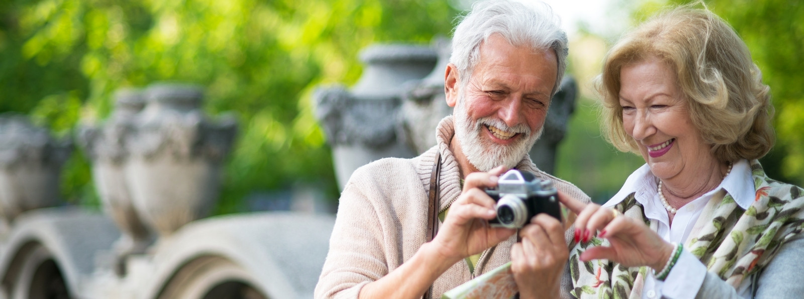 Older couple looking at photos