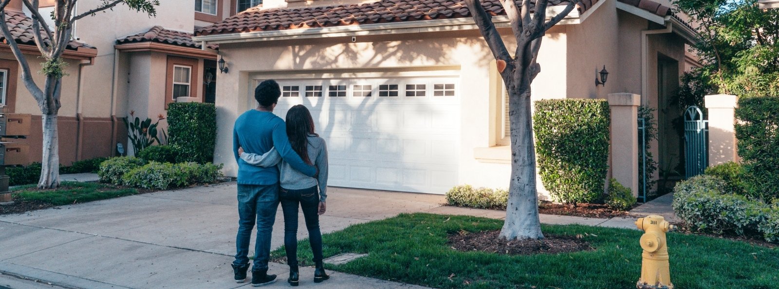 Couple looking at a house